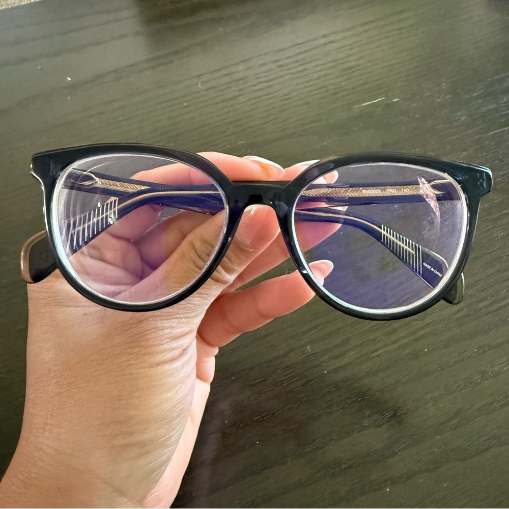 Rag & Bone eyeglasses with a black frame RNB3029 YRQ 140